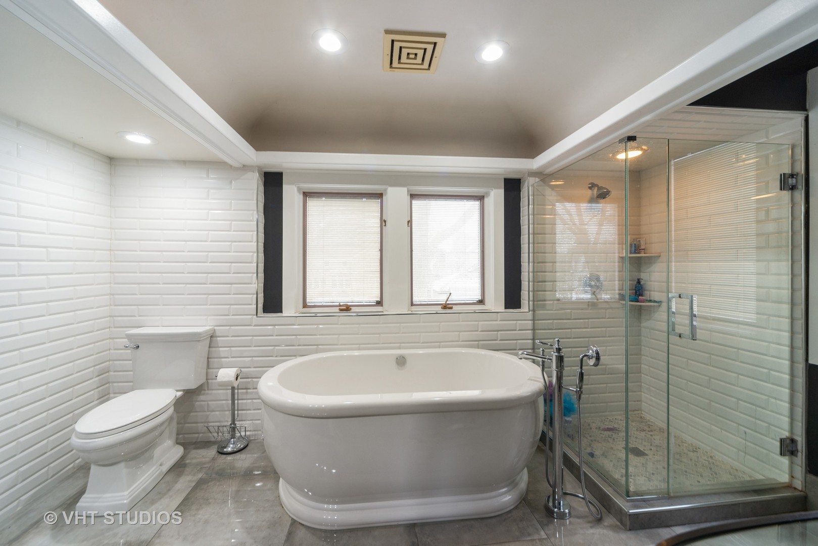 749 Elmore Street Park Ridge, IL 60068 - Photo 9 of 10 a spacious bathroom with a bathtub shower sink mirror and toilet