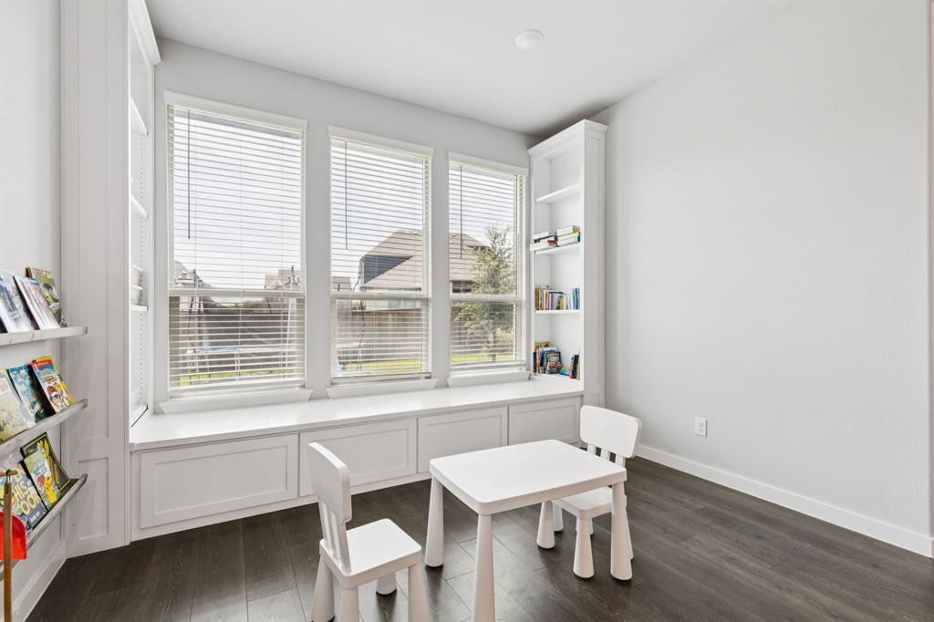 2805 Tower Road Mansfield, TX 76063 - Photo 13 of 33 a view of a room with a window and wooden floor