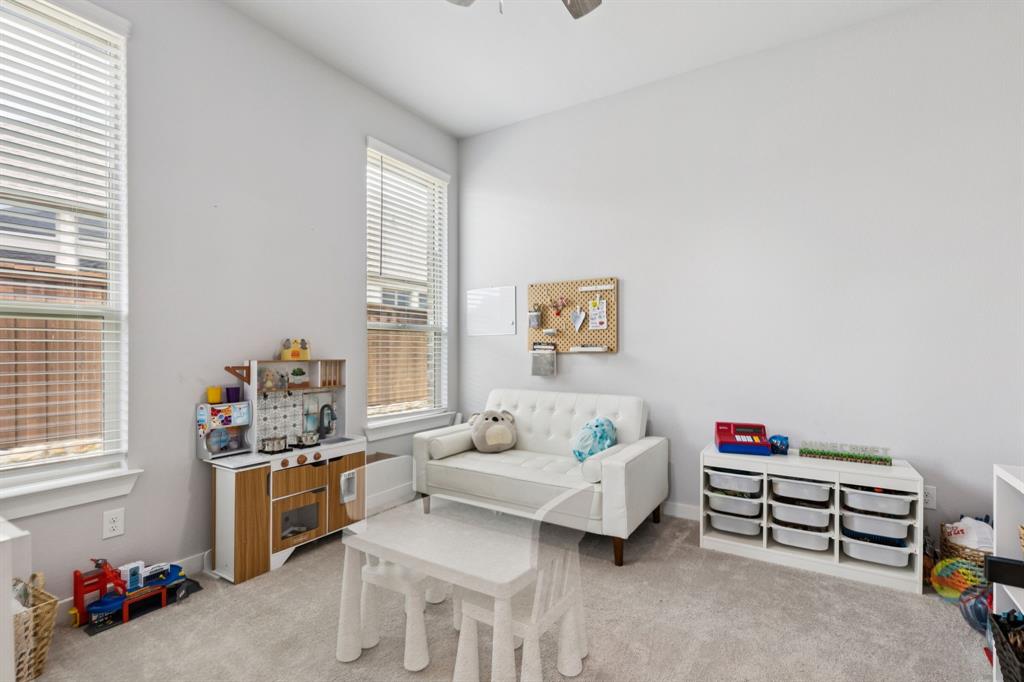 2805 Tower Road Mansfield, TX 76063 - Photo 26 of 33 a living room with furniture and a window