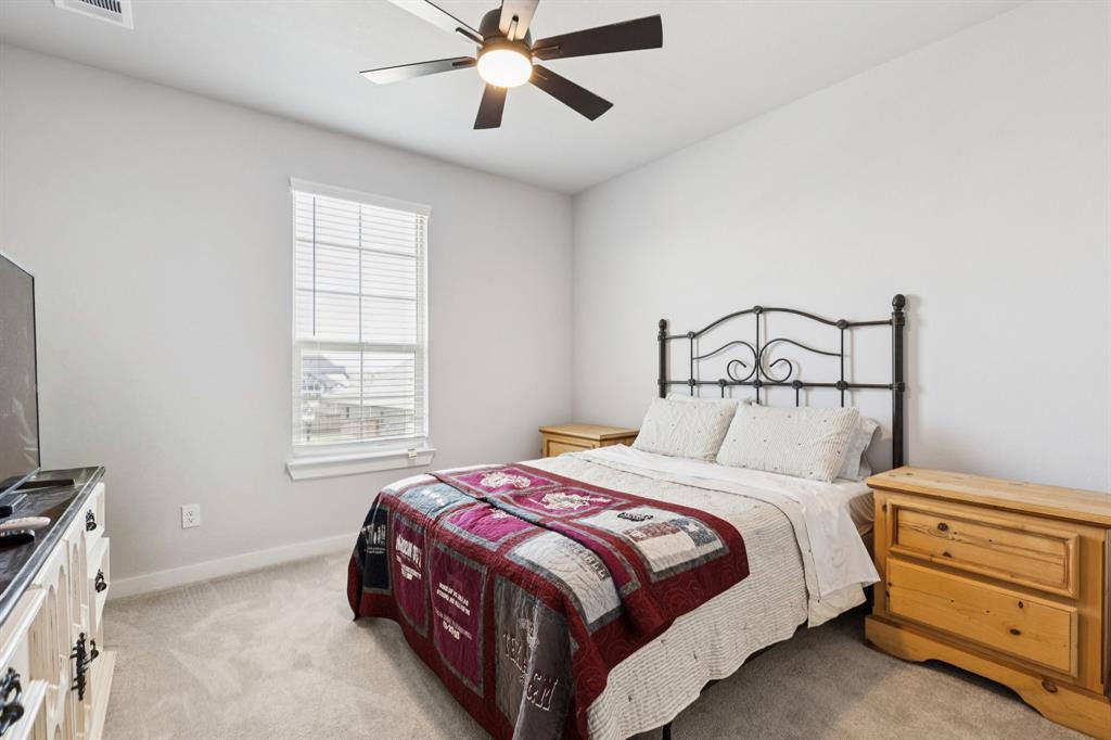2805 Tower Road Mansfield, TX 76063 - Photo 27 of 33 a bedroom with a bed and a window