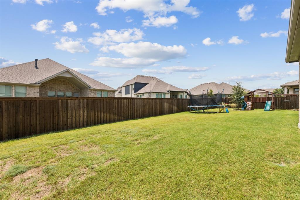 2805 Tower Road Mansfield, TX 76063 - Photo 31 of 33 a view of front of house with a yard