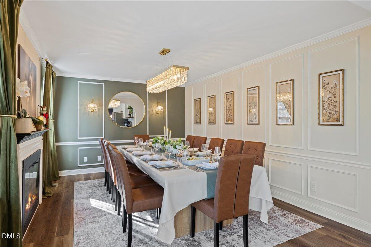 300 Pate Street Apex, NC 27502 - Photo 16 of 57 a view of a dining room with furniture