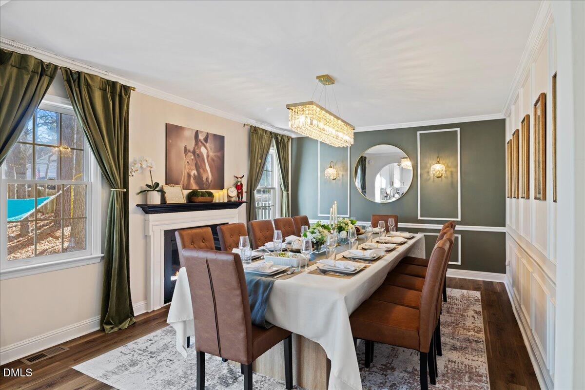 300 Pate Street Apex, NC 27502 - Photo 17 of 57 a view of a dining room and livingroom view