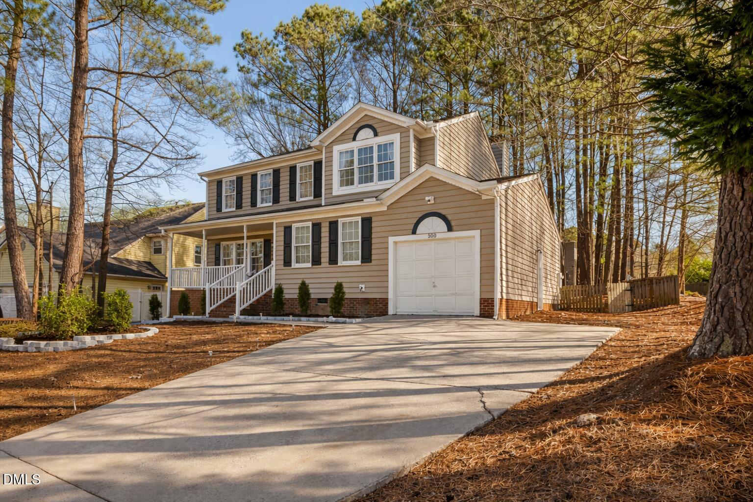 300 Pate Street Apex, NC 27502 - Photo 2 of 57 a front view of a house with a yard