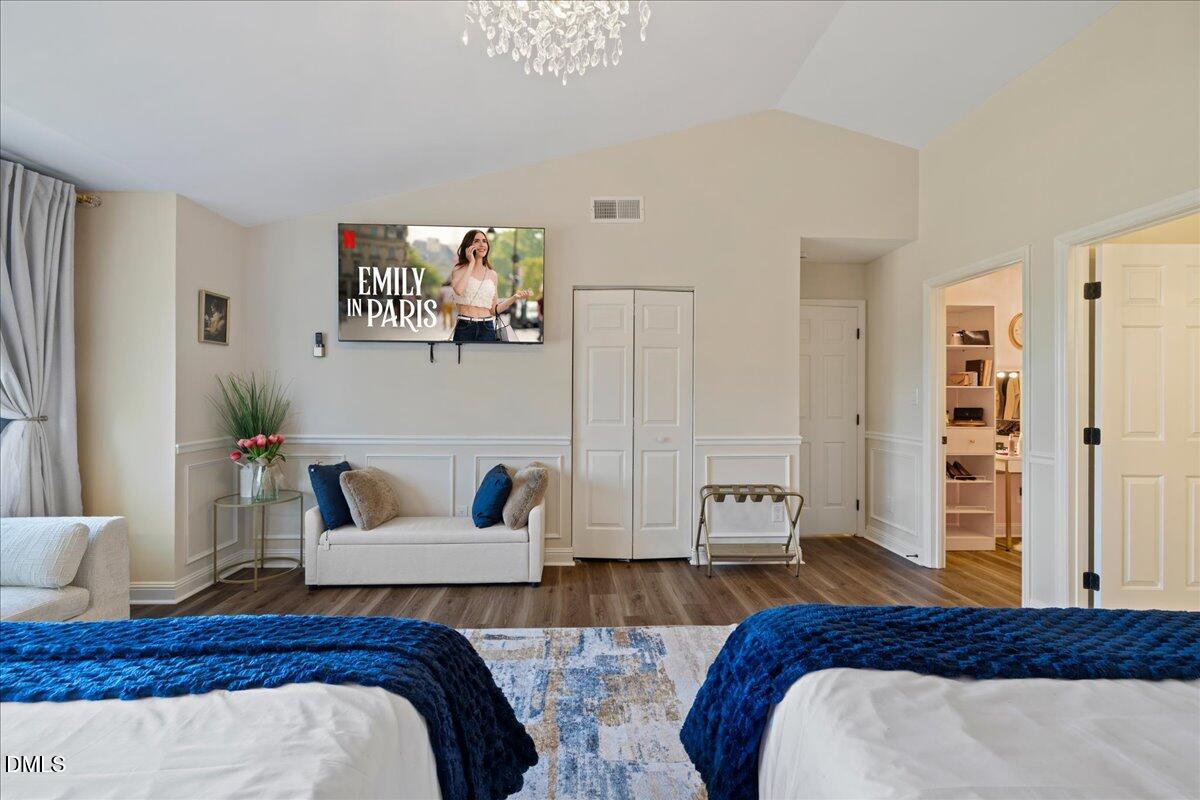 300 Pate Street Apex, NC 27502 - Photo 36 of 57 a bedroom with two beds and painting on the wall