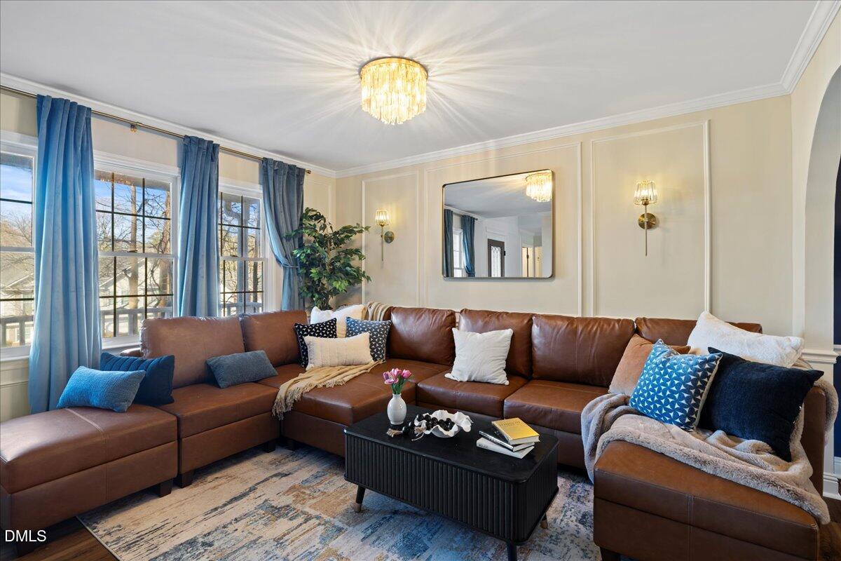300 Pate Street Apex, NC 27502 - Photo 4 of 57 a living room with furniture and a large window