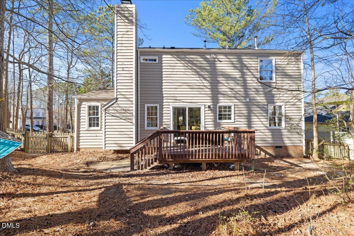 300 Pate Street Apex, NC 27502 - Photo 45 of 57 a view of a house with a small yard and wooden fence