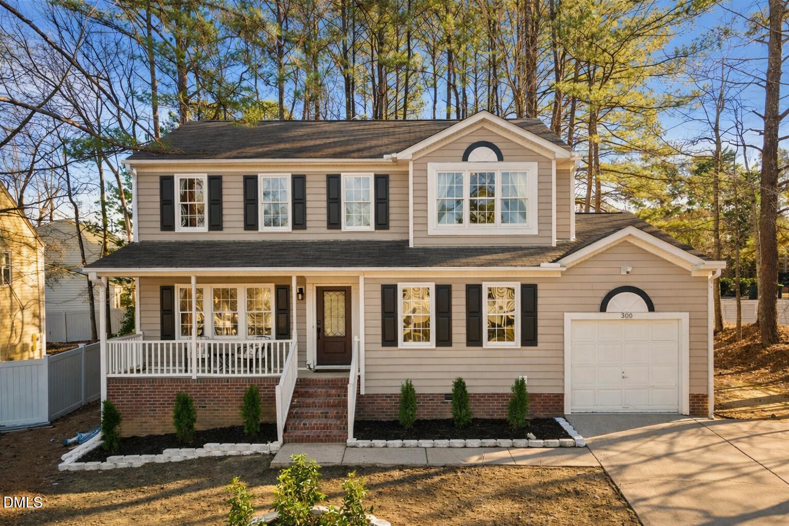 300 Pate Street Apex, NC 27502 - Photo 56 of 57 a front view of a house with a yard
