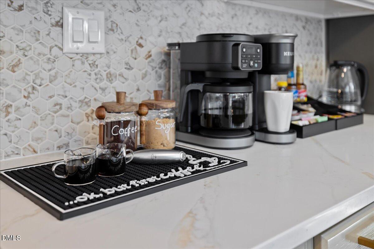 300 Pate Street Apex, NC 27502 - Photo 9 of 57 a stove top oven sitting inside of a kitchen