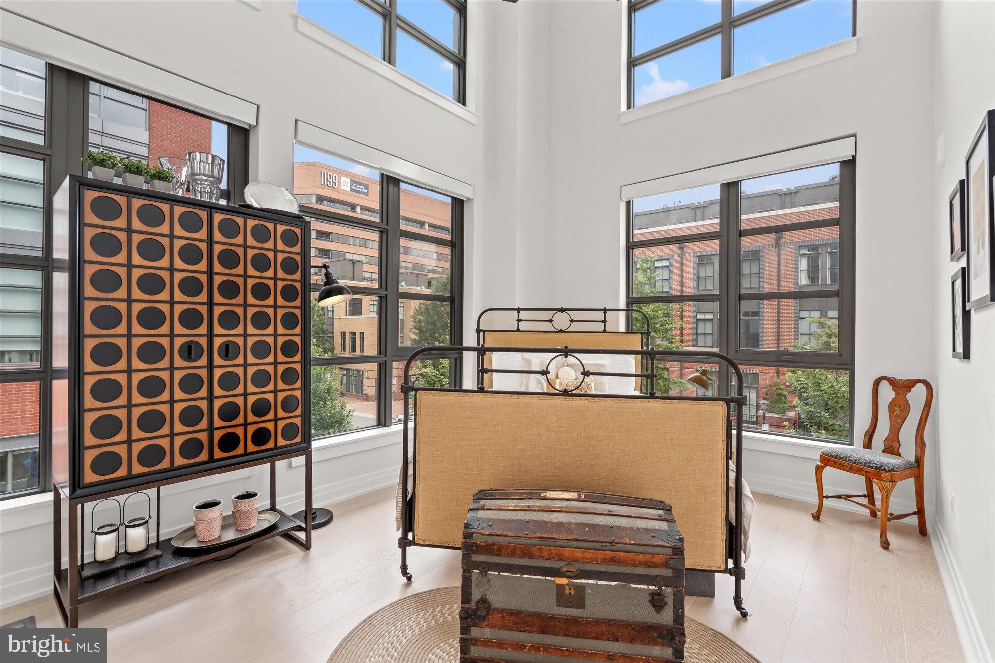 1201 North Royal Street, Unit 214 Alexandria, VA 22314 - Photo 15 of 71 a reading room with furniture and a window