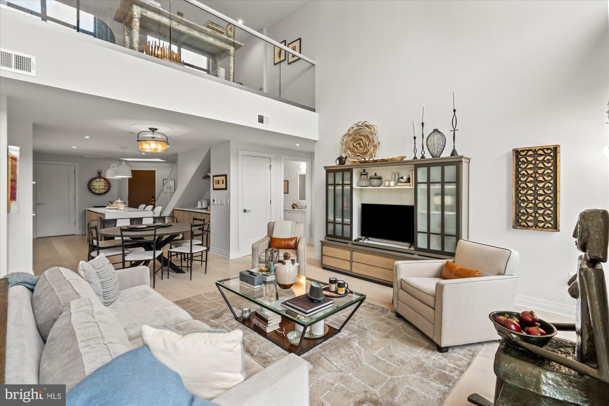 1201 North Royal Street, Unit 214 Alexandria, VA 22314 - Photo 18 of 71 a living room with furniture and a fireplace