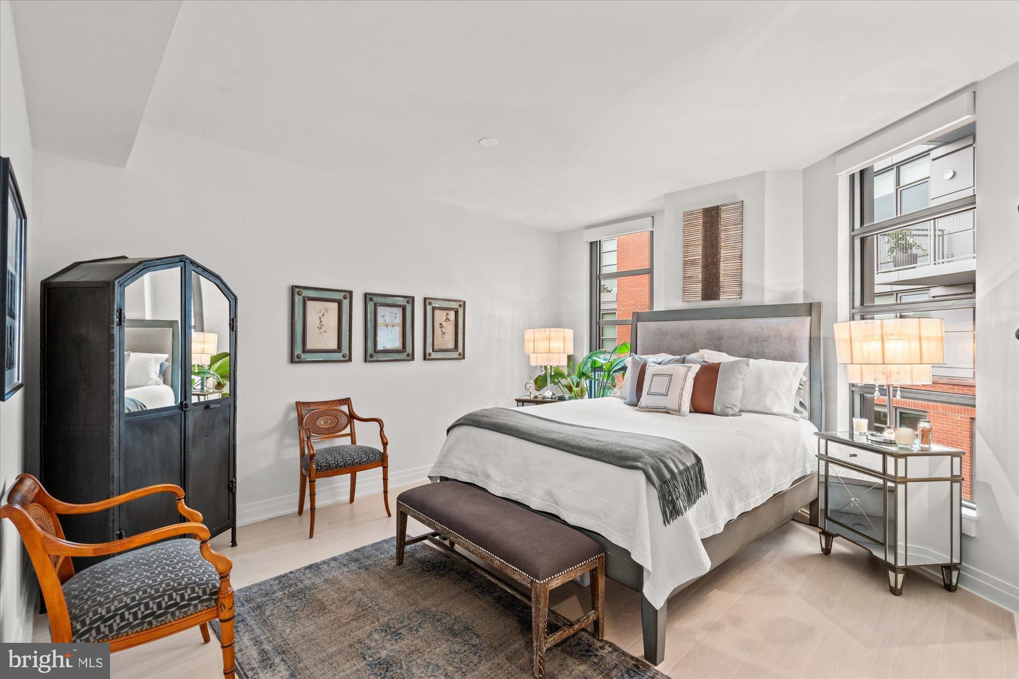 1201 North Royal Street, Unit 214 Alexandria, VA 22314 - Photo 31 of 71 a bedroom with a bed chair and window