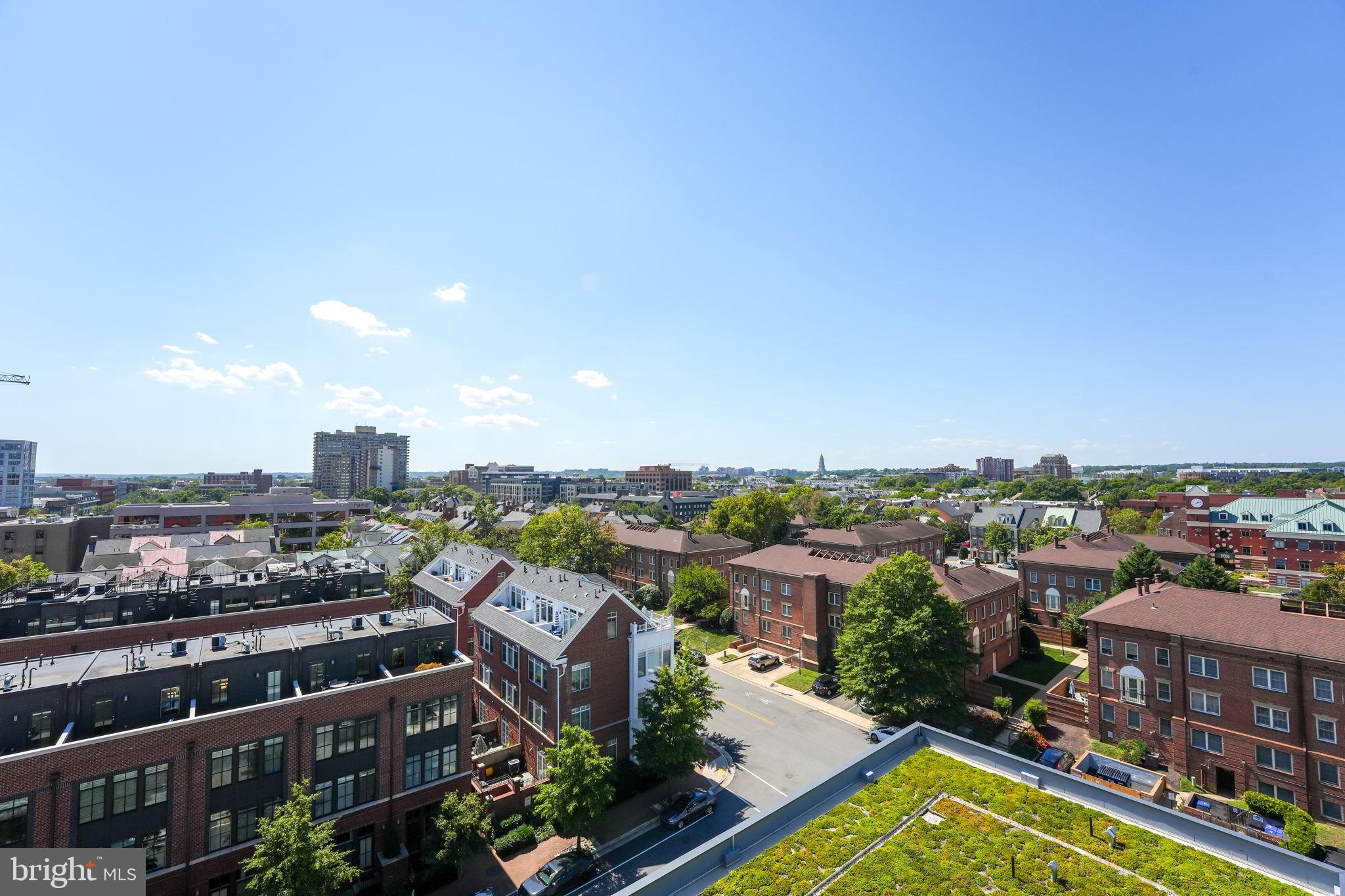 1201 North Royal Street, Unit 214 Alexandria, VA 22314 - Photo 40 of 71 Urban skyline meets serene greenery.