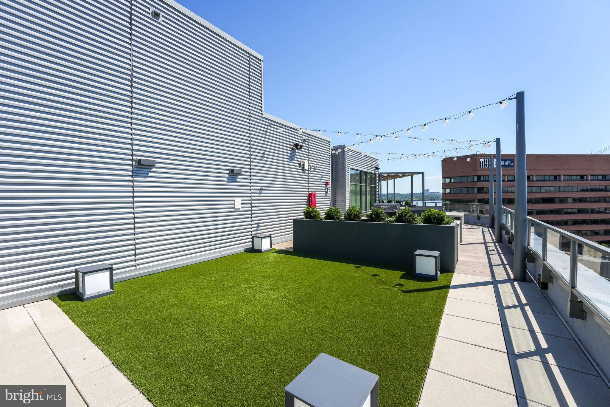 1201 North Royal Street, Unit 214 Alexandria, VA 22314 - Photo 41 of 71 a view of a terrace with chairs