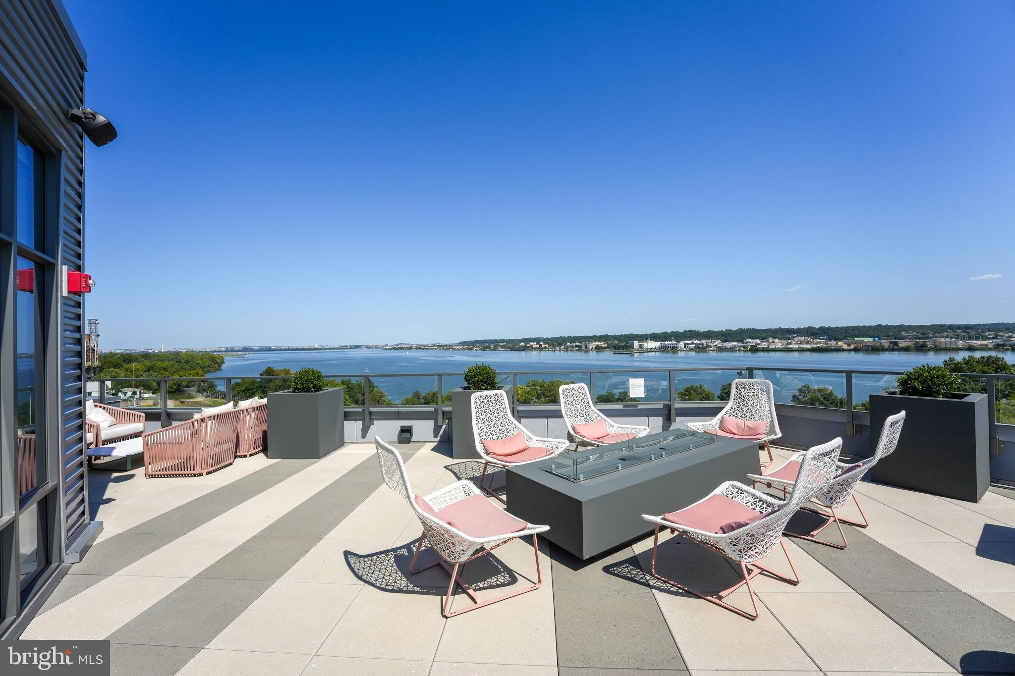 1201 North Royal Street, Unit 214 Alexandria, VA 22314 - Photo 45 of 71 Rooftop retreat with stunning water views.