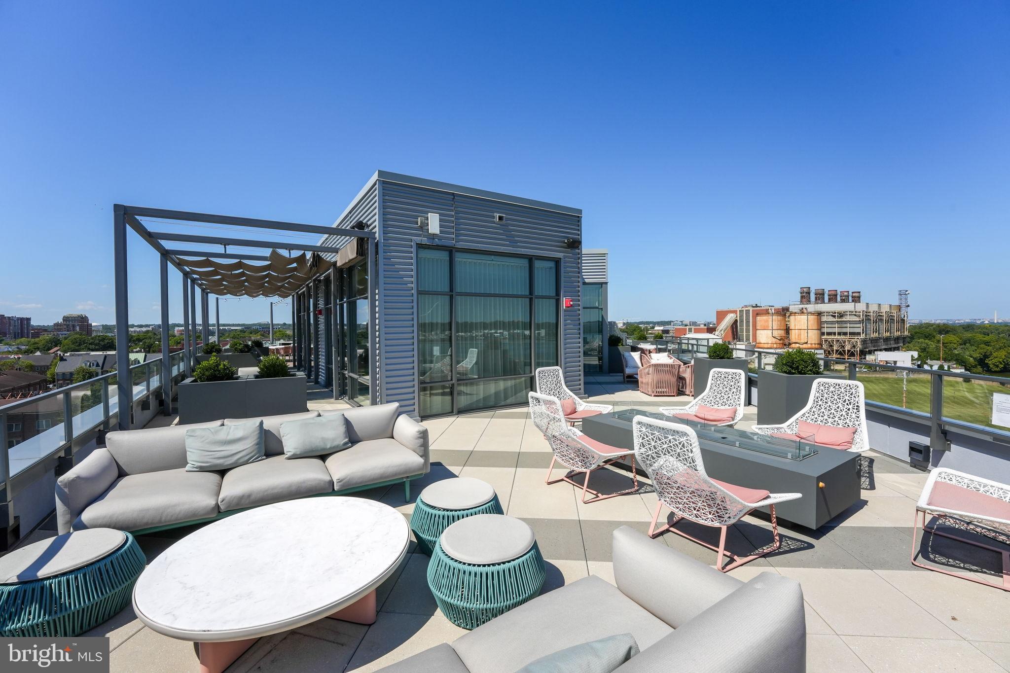 1201 North Royal Street, Unit 214 Alexandria, VA 22314 - Photo 47 of 71 Stunning rooftop retreat with city views.