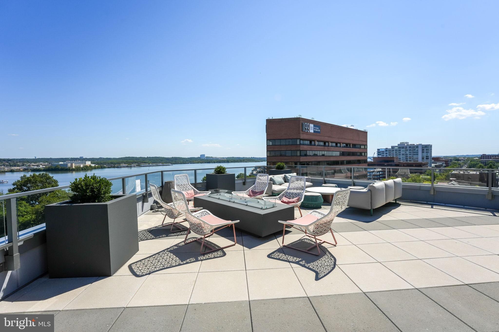 1201 North Royal Street, Unit 214 Alexandria, VA 22314 - Photo 53 of 71 Rooftop retreat with stunning water views.
