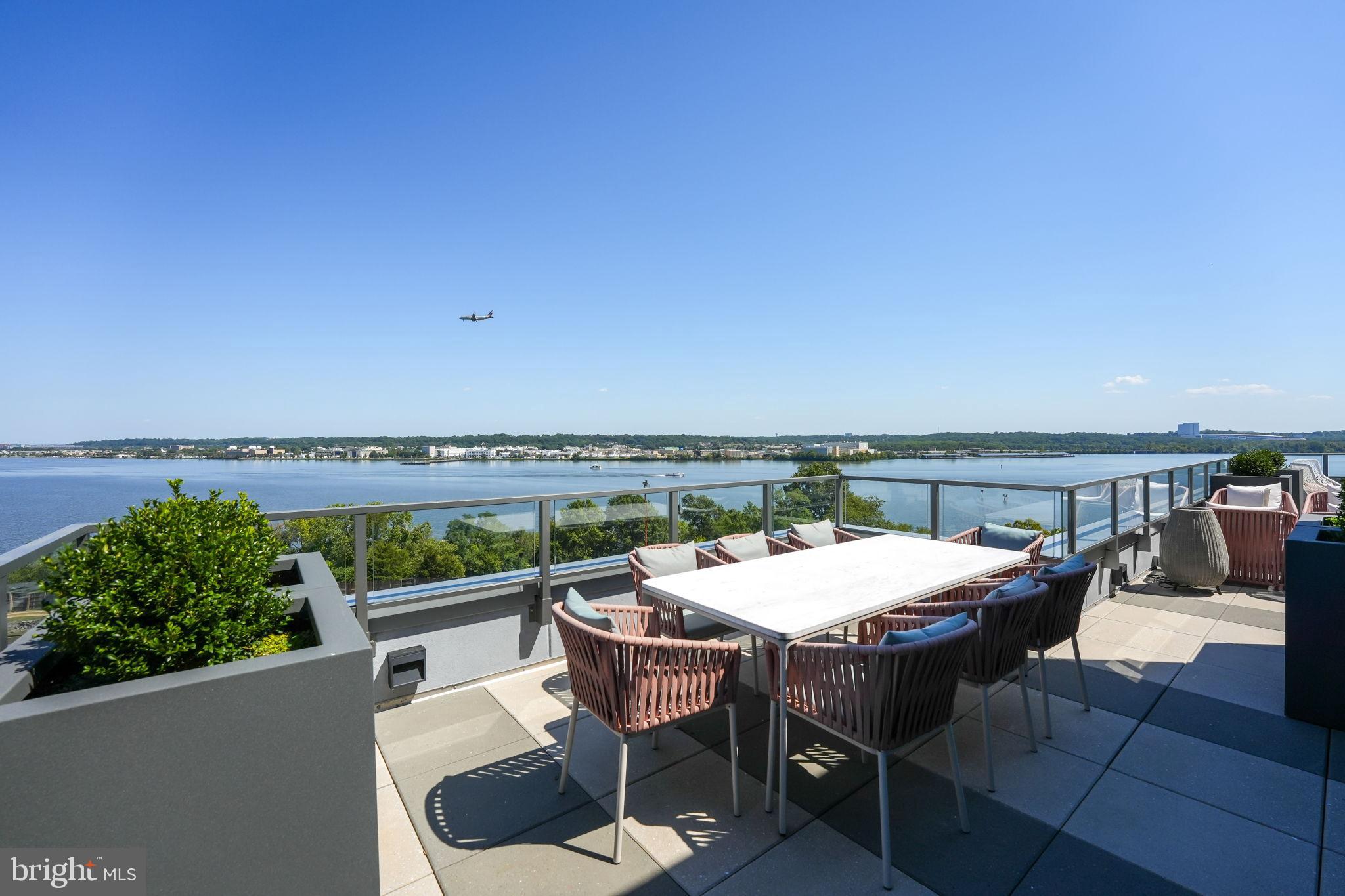 1201 North Royal Street, Unit 214 Alexandria, VA 22314 - Photo 55 of 71 a view of chairs and table in patio