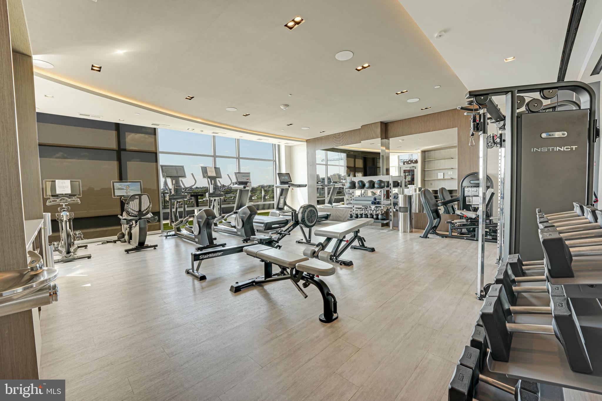 1201 North Royal Street, Unit 214 Alexandria, VA 22314 - Photo 61 of 71 a view of a room with gym equipment