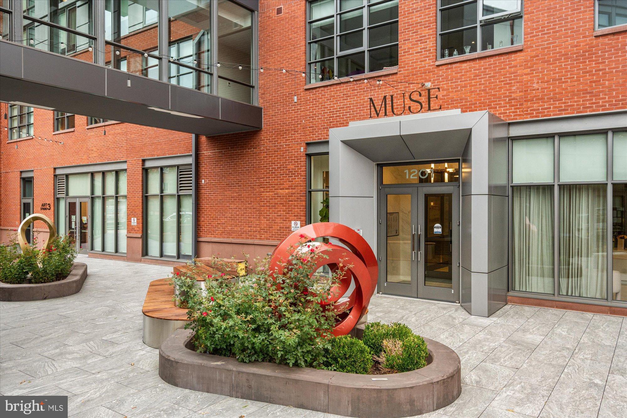 1201 North Royal Street, Unit 214 Alexandria, VA 22314 - Photo 71 of 71 Modern urban entrance with artistic flair.