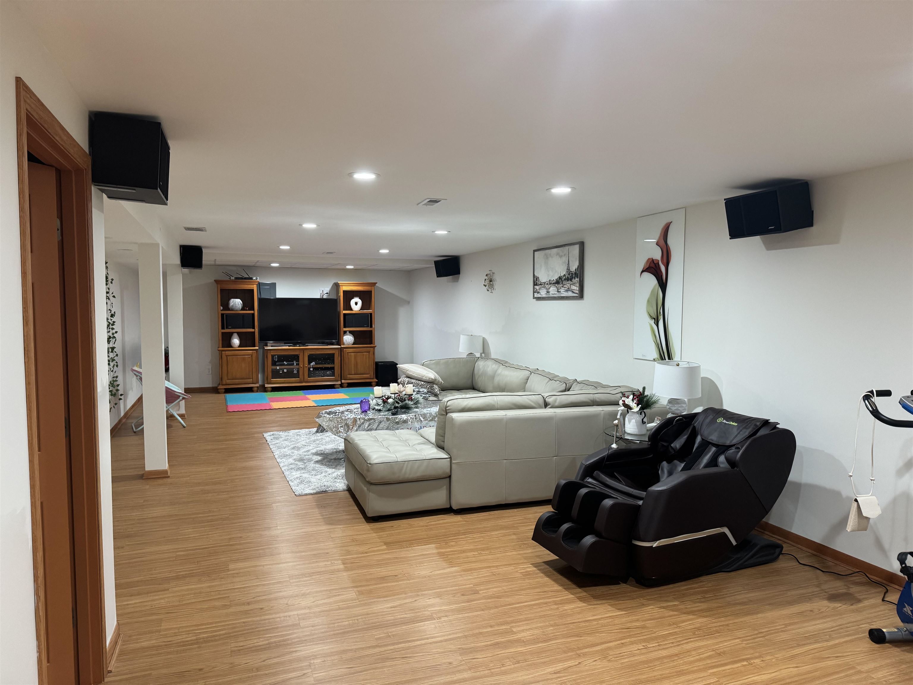 1916 Prestwold Place Machesney Park, IL 61115 - Photo 8 of 9 a living room with furniture and a wooden floor