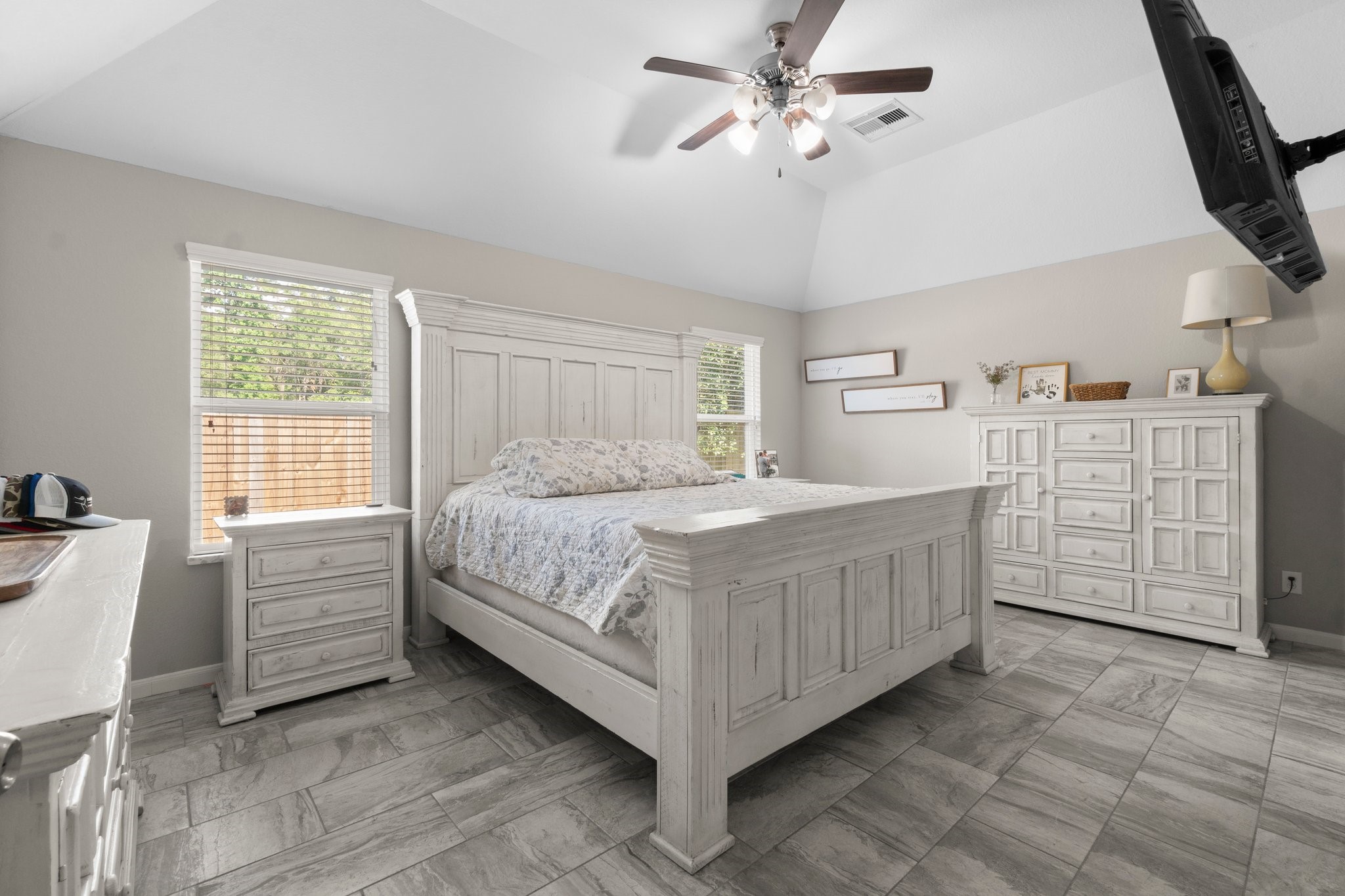 28987 Birch Green Way Spring, TX 77386 - Photo 16 of 32 a bedroom with a bed cabinets and a window