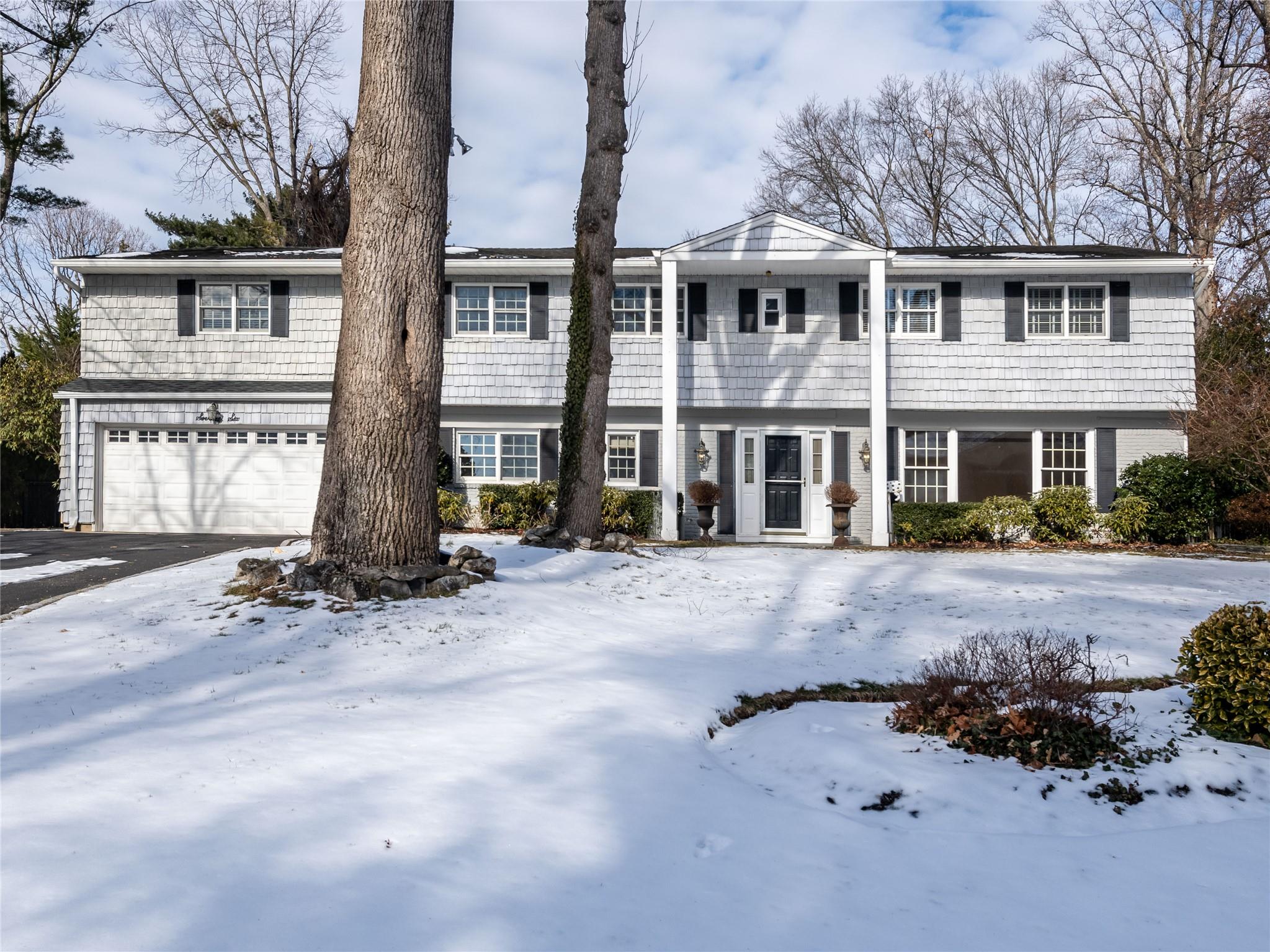Spacious 6 bedroom Flower Hill Colonial