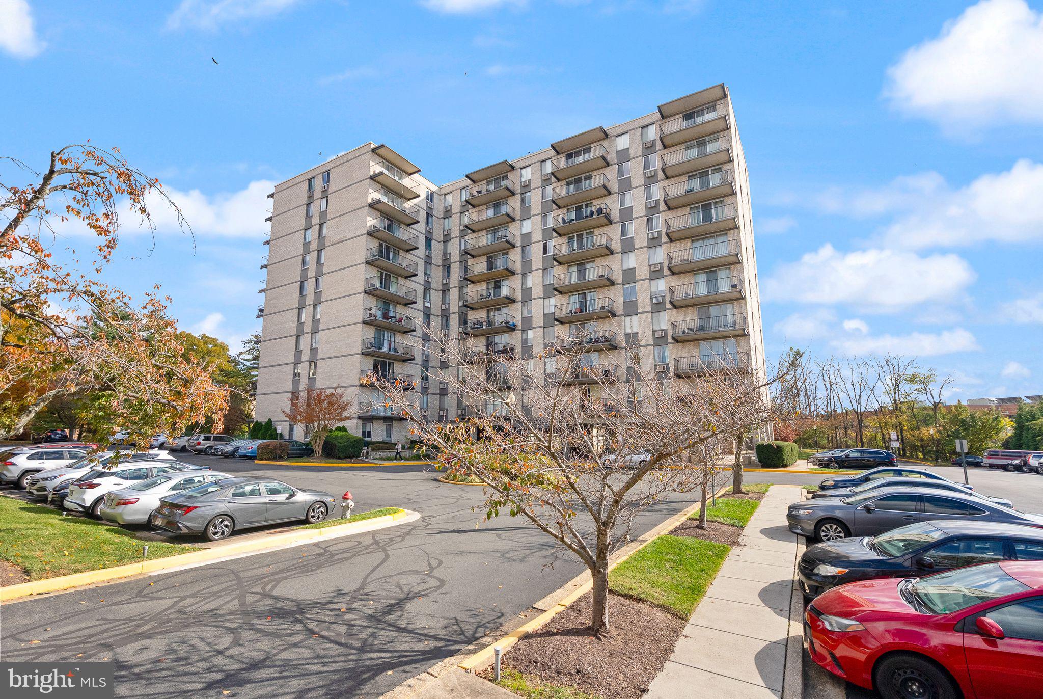 3245 Rio Drive, Unit 608 Falls Church, VA 22041 - Photo 2 of 36 a city view with tall buildings