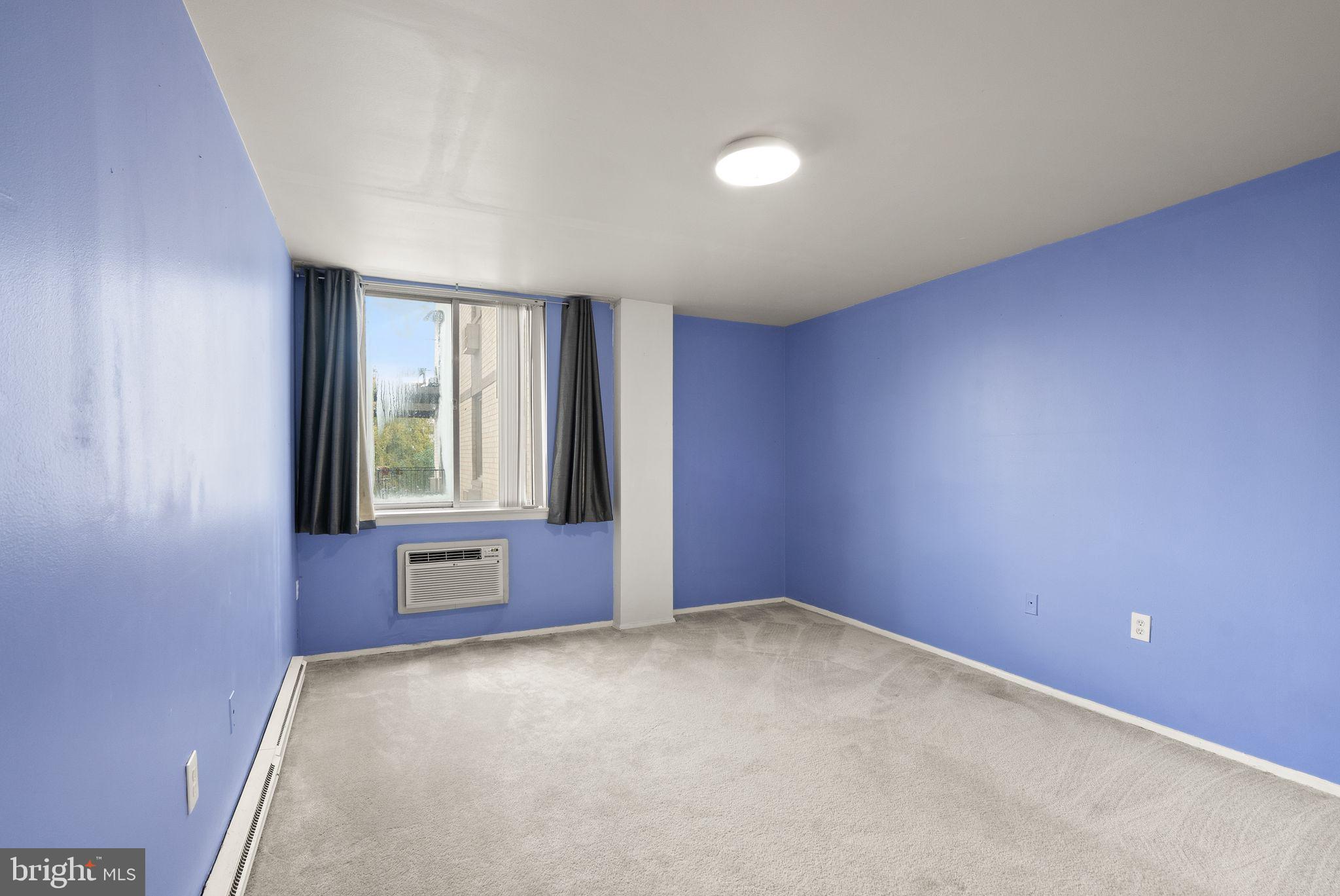 3245 Rio Drive, Unit 608 Falls Church, VA 22041 - Photo 23 of 36 an empty room with windows