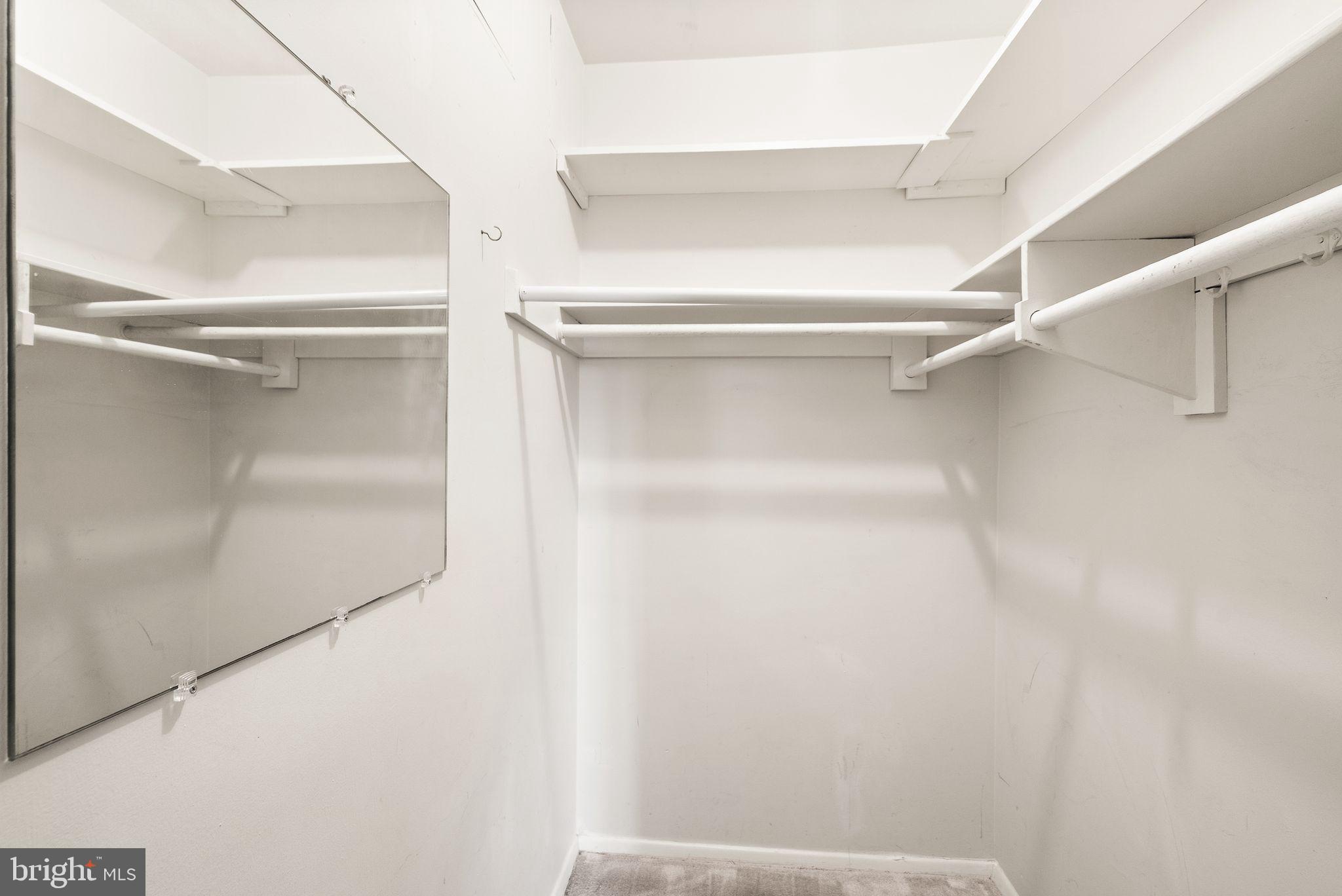 3245 Rio Drive, Unit 608 Falls Church, VA 22041 - Photo 32 of 36 a view of walk in closet with empty racks