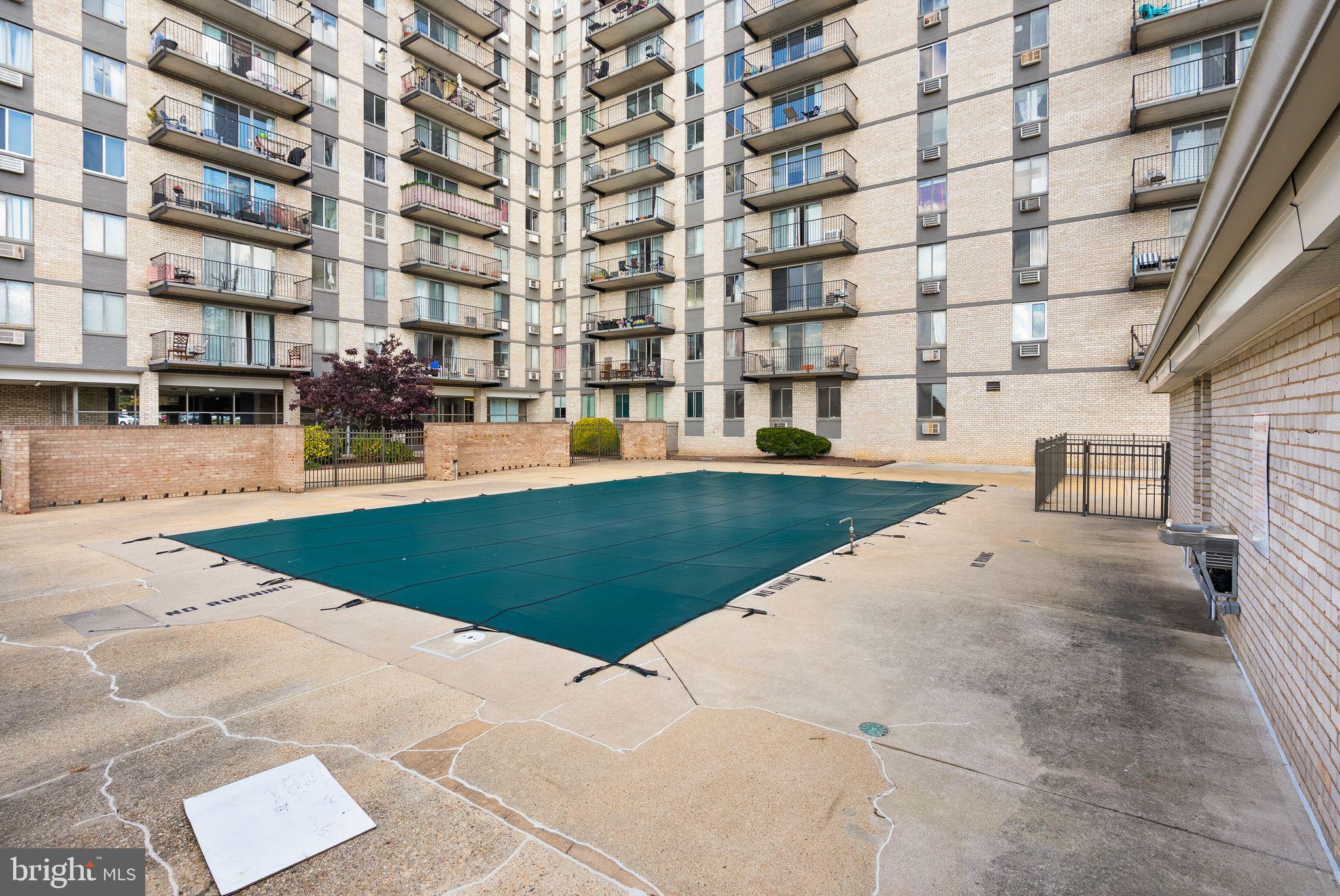 3245 Rio Drive, Unit 608 Falls Church, VA 22041 - Photo 34 of 36 a view of a building with yard