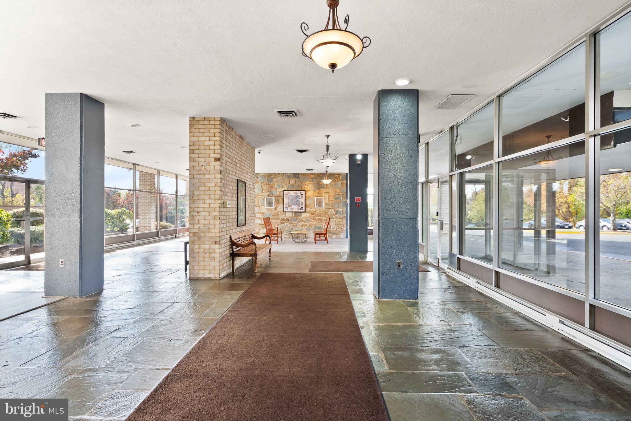 3245 Rio Drive, Unit 608 Falls Church, VA 22041 - Photo 8 of 36 a view of a living room and dining room