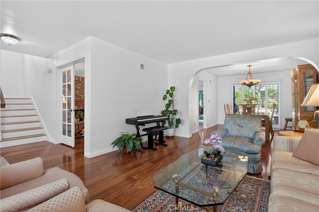12231 Eagle Ridge Way Porter Ranch, CA 91326 - Photo 11 of 65 a living room with furniture and wooden floor