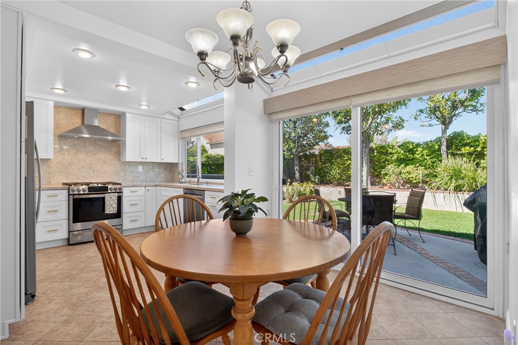 12231 Eagle Ridge Way Porter Ranch, CA 91326 - Photo 14 of 65 a view of a dining room with furniture window and outside view