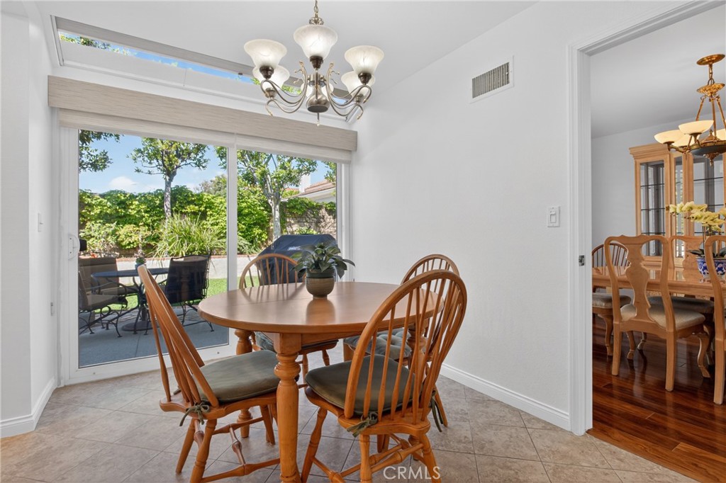 12231 Eagle Ridge Way Porter Ranch, CA 91326 - Photo 15 of 65 a view of a dining room with furniture window and outside view