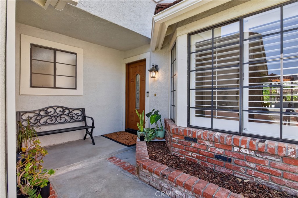 12231 Eagle Ridge Way Porter Ranch, CA 91326 - Photo 3 of 65 a view of a house with a balcony