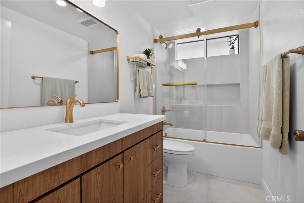 12231 Eagle Ridge Way Porter Ranch, CA 91326 - Photo 33 of 65 a bathroom with a sink a toilet and a shower