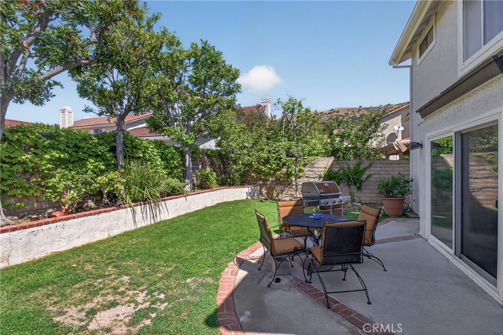 12231 Eagle Ridge Way Porter Ranch, CA 91326 - Photo 40 of 65 a view of a backyard with sitting area