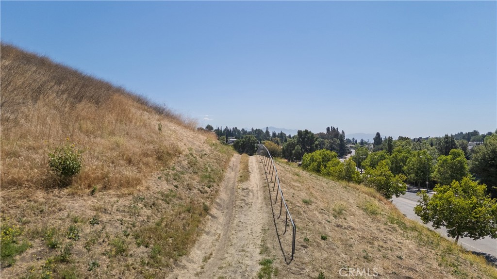 12231 Eagle Ridge Way Porter Ranch, CA 91326 - Photo 46 of 65 a view of a dry yard with mountains in the background