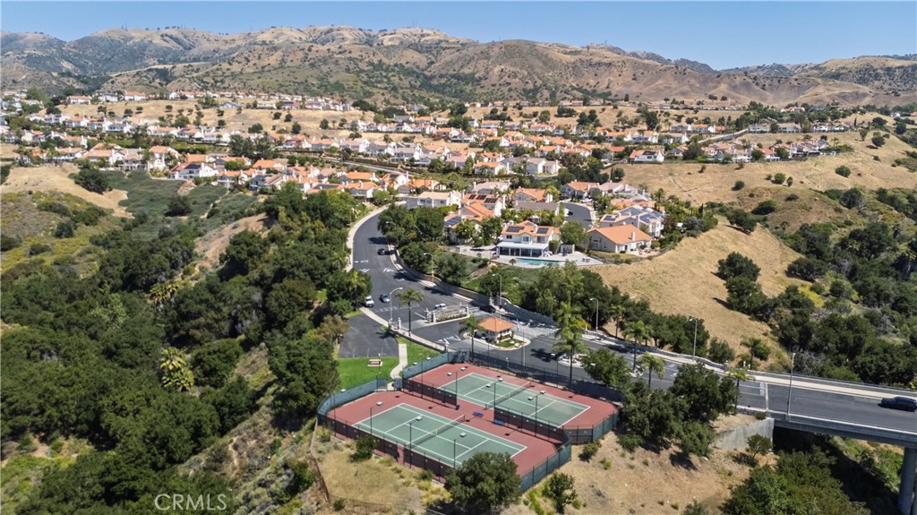 12231 Eagle Ridge Way Porter Ranch, CA 91326 - Photo 50 of 65 an aerial view of a city with lots of residential buildings