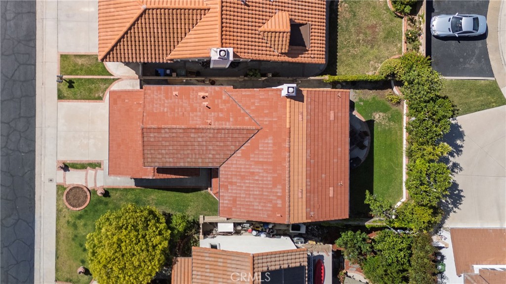 12231 Eagle Ridge Way Porter Ranch, CA 91326 - Photo 53 of 65 an aerial view of a house with a yard and potted plants