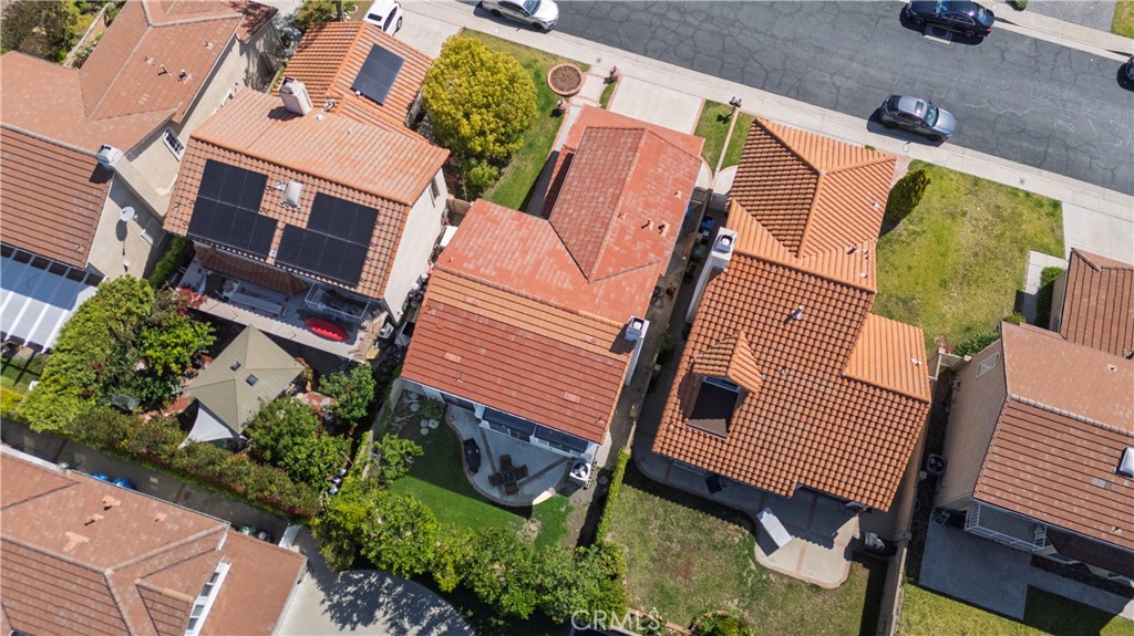 12231 Eagle Ridge Way Porter Ranch, CA 91326 - Photo 54 of 65 an aerial view of a house with a yard patio and furniture