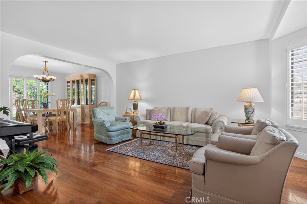 12231 Eagle Ridge Way Porter Ranch, CA 91326 - Photo 10 of 65 a living room with furniture and wooden floor