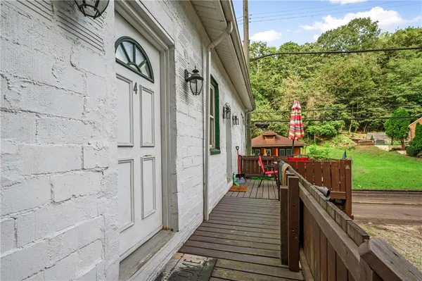 a view of a balcony with an outdoor space