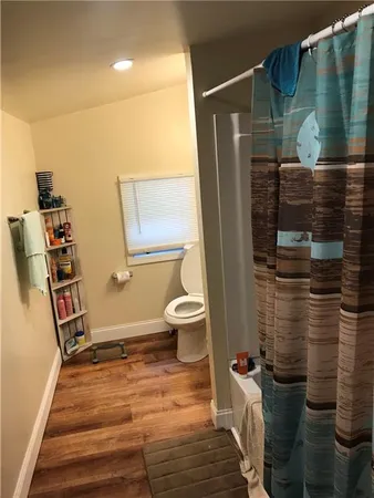 a bathroom with a sink and toilet