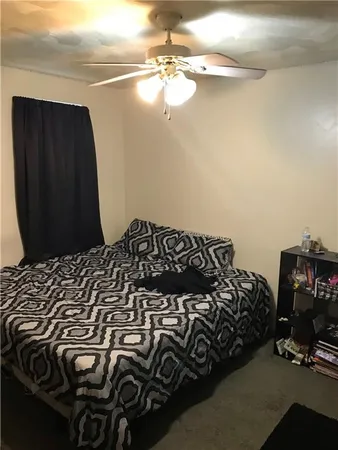 a bedroom with a bed