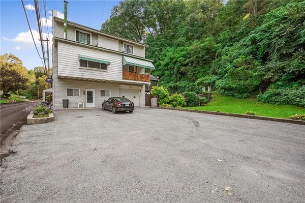 a view of a house with a patio