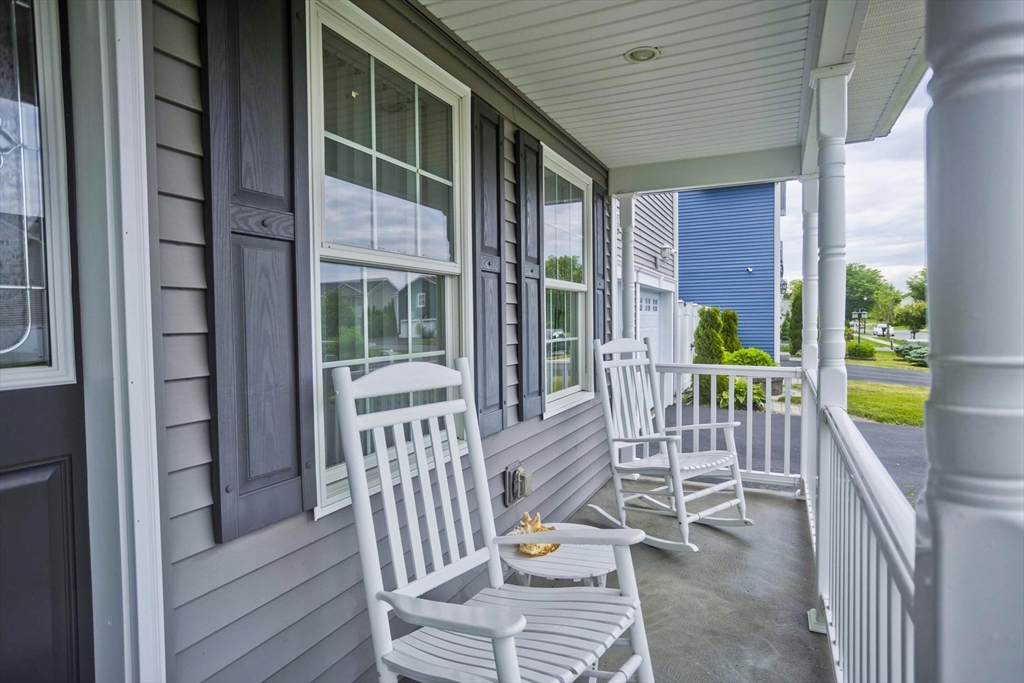 210 Naismith Street Springfield, MA 01104 - Photo 2 of 42 a view of a balcony with chairs