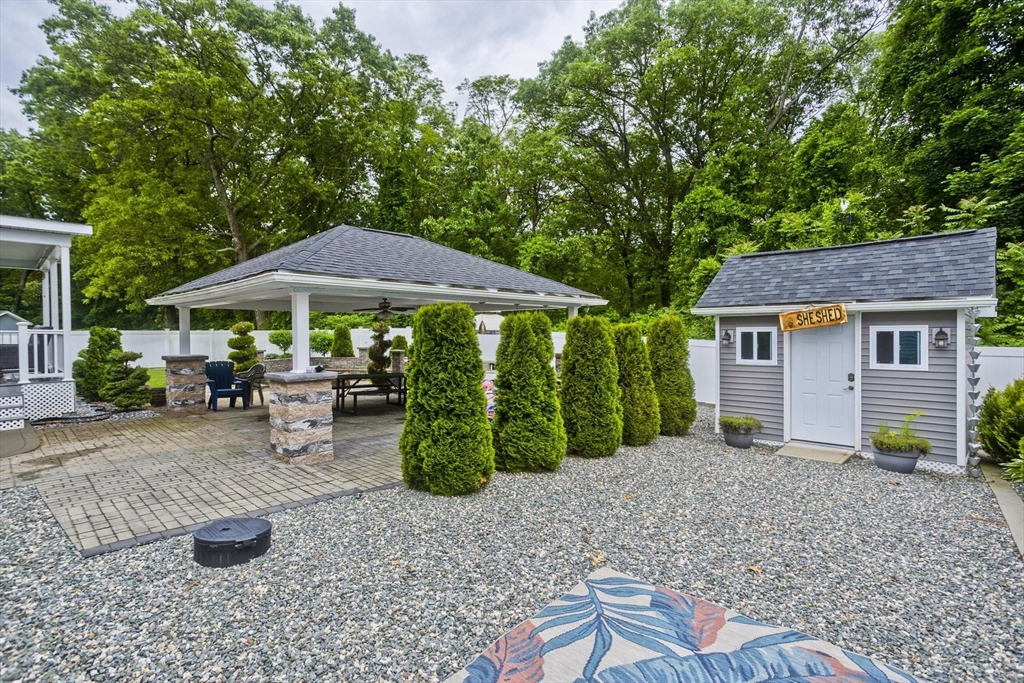 210 Naismith Street Springfield, MA 01104 - Photo 34 of 42 a view of a house with backyard and sitting area