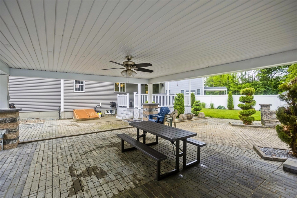 210 Naismith Street Springfield, MA 01104 - Photo 36 of 42 a living room with patio furniture and a large window